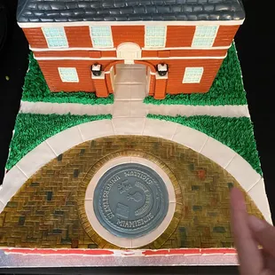 Miami Merger Grooms cake of Upham hall and seal