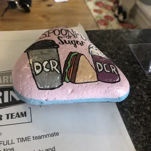 a rock with a sandwich on it