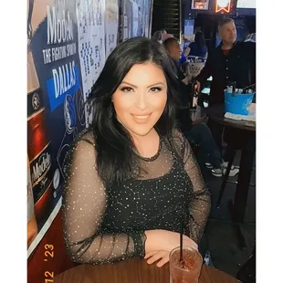 a woman sitting at a table