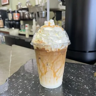 Iced Carmel latte with whip (Carmel drizzle is included)