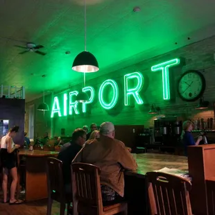 The waitress offered to turn on the airport sign long enough to snap this photo.  Great fun.