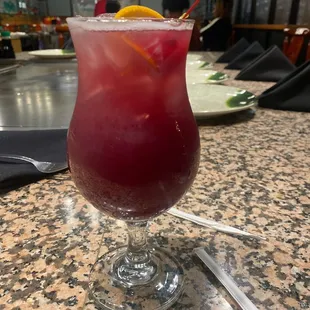 a red drink in a glass