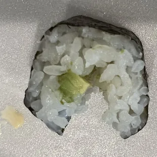 That dot was the only avocado that piece got- the rest was just rice. RIP OFF!!!