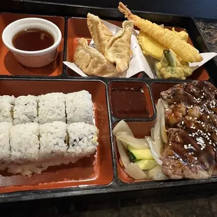$15 Combo with Teriyaki Steak/ Crab Roll, Shrimp and Veggie Tempura and Gyoza. (Wonton Soup on the side)