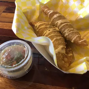 Empanadas (1 beef 1 spinach and cheese) with cheese drizzle finish