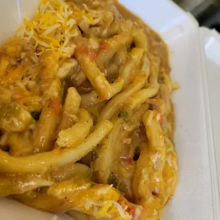 a plate of pasta and cheese