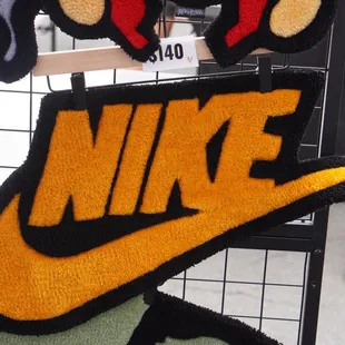 Nike designed carpet mat $140.00 fR. Lux Of Love vendor at Taste of KALIHI market 2023 *7/15/23