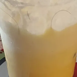 a drink in a plastic cup