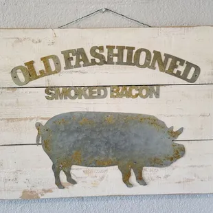an old fashioned smoked bacon sign