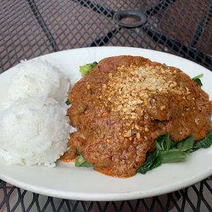 Pra Ram with fried tofu.  Spice level 4 isn't spicy in this particular dish.  So full of creamy peanut goodness!