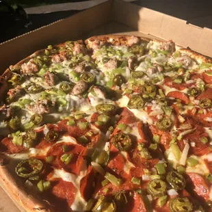 Half pepperoni half sausage, all green pepper, onion, and jalapeños.