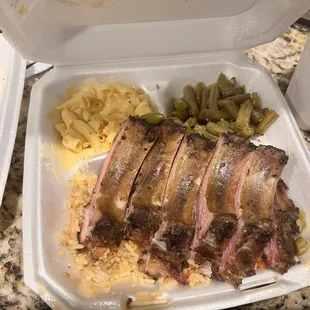 Smoked pork ribs over dirty rice mac&amp;cheese, green beans