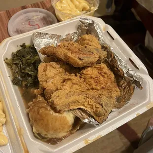 fried pork chops with the mashed potatoes and gravy, macaroni and greens! It was lightly seasoned and really good.