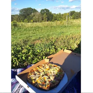 Slab bacon pizza with hot peppers, tomatoes, and onions. A+
