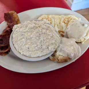 Breakfast platter. Grits, gravy, biscuits, eggs cooked exactly as ordered, and tasty bacon.