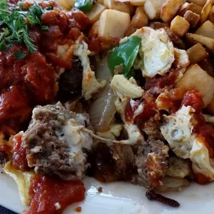 The Godfather omelette. House made meatballs inside with pepper and onion