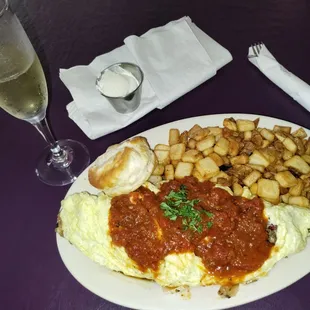 The Godfather omelette. House made meatballs inside. House.ade butter for biscuit