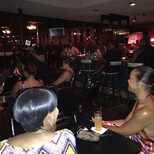 a group of people sitting at a table