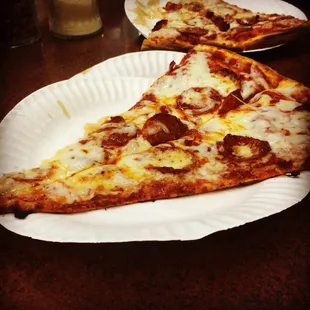 Fresh out the oven my big slice of pepperoni.. $3.00 legit for being in this city.. Need more places like this!!