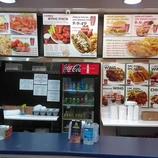 a counter with menus on it