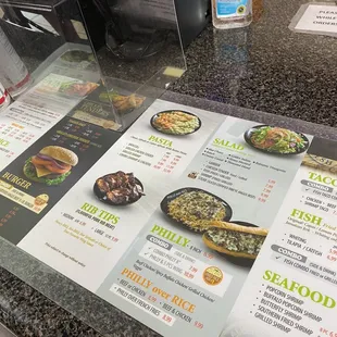 a menu on a counter