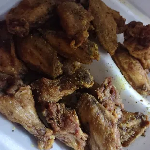 a plate of fried wings