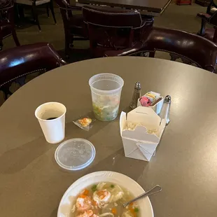 a bowl of soup and a cup of coffee