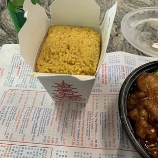 a bowl of noodles and a drink