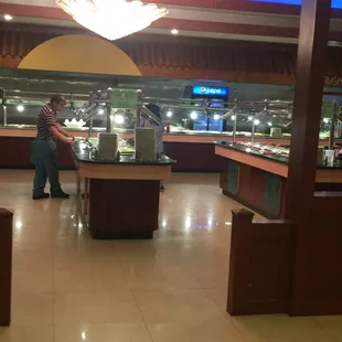 a man preparing food in a restaurant