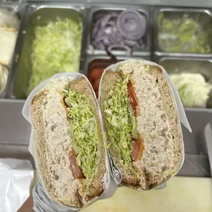 Tuna salad sandwich on sliced wheat bread :)