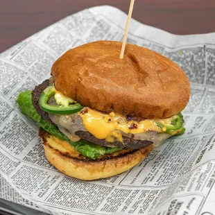 FIREBALL: 
SPICY MAYO, LETTUCE, TOMATO, FRESH JALAPINO, NACHO CHEESE AND PEPPER JACK CHEESE WITH CRUSHED RED PEPPER.