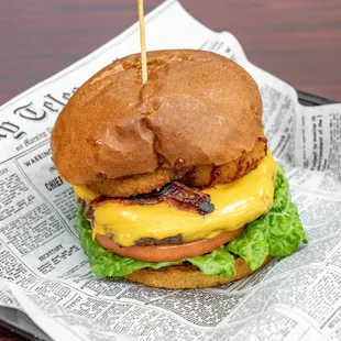 COWBOY; 
LETTUCE TOMATOES, TURKEY BACON (HALAL), ONION RINGS BBQ WITH AMERICAN CHEESE