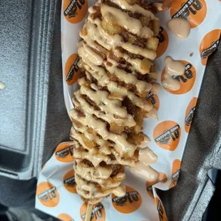 Korean potato wrapped dog half cheese half dog