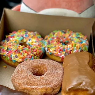 a variety of donuts in a box