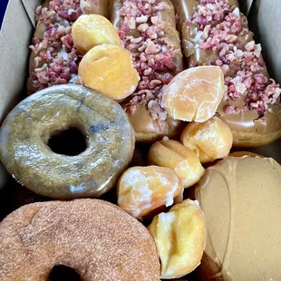 Maple bacon, blueberry, plain, pb&amp;j, apple fritter, and free donut holes