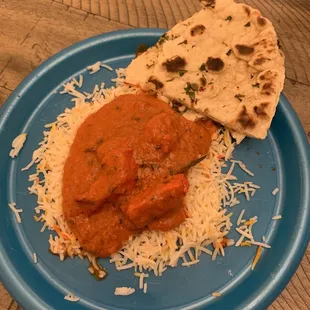 Half of my Chicken Tikka Masala and Garlic Naan. I was a pig and ate the other half shortly after this. So good.