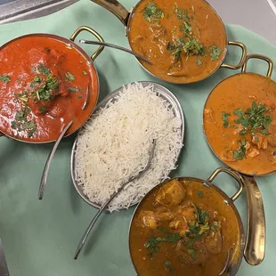 a variety of curry dishes