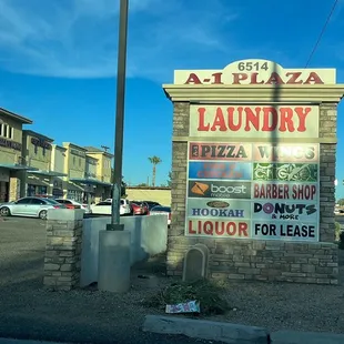 a sign for a laundry