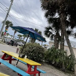 Cute little tables to lounge and enjoy your meal.
