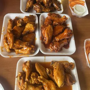 Teryaki wings (top), mango habanero (middle left), spicy bbq (middle right), and hot (bottom)