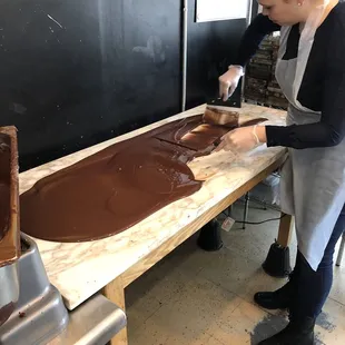 Amanda cooling the chocolate to temper it