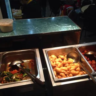 a buffet with a variety of food items