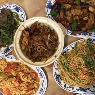 a variety of dishes of food