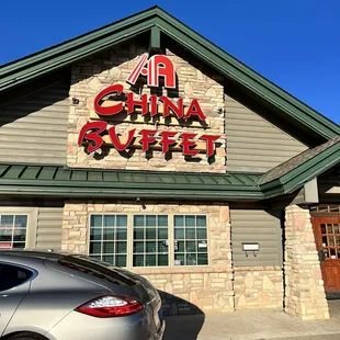 a car parked in front of the restaurant