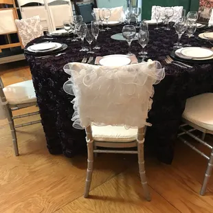 60&quot; round table with our rosette linen, chiavari chairs in silver.