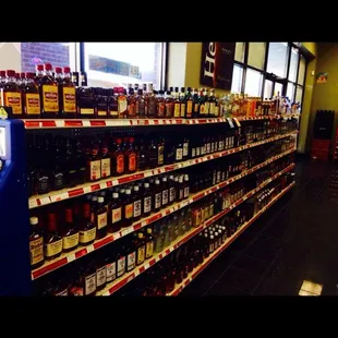 shelves of liquor and cigarettes