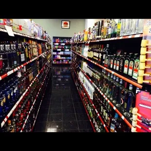 the aisle of a liquor store