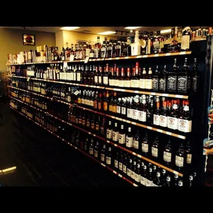 shelves of alcohol and cigarettes