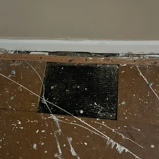 Mastic glue under corkboard squares