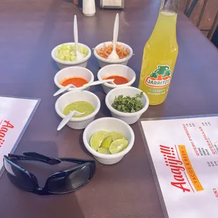 Look at this taco condiment spread! It makes you question your culinary prowess on the weekends.